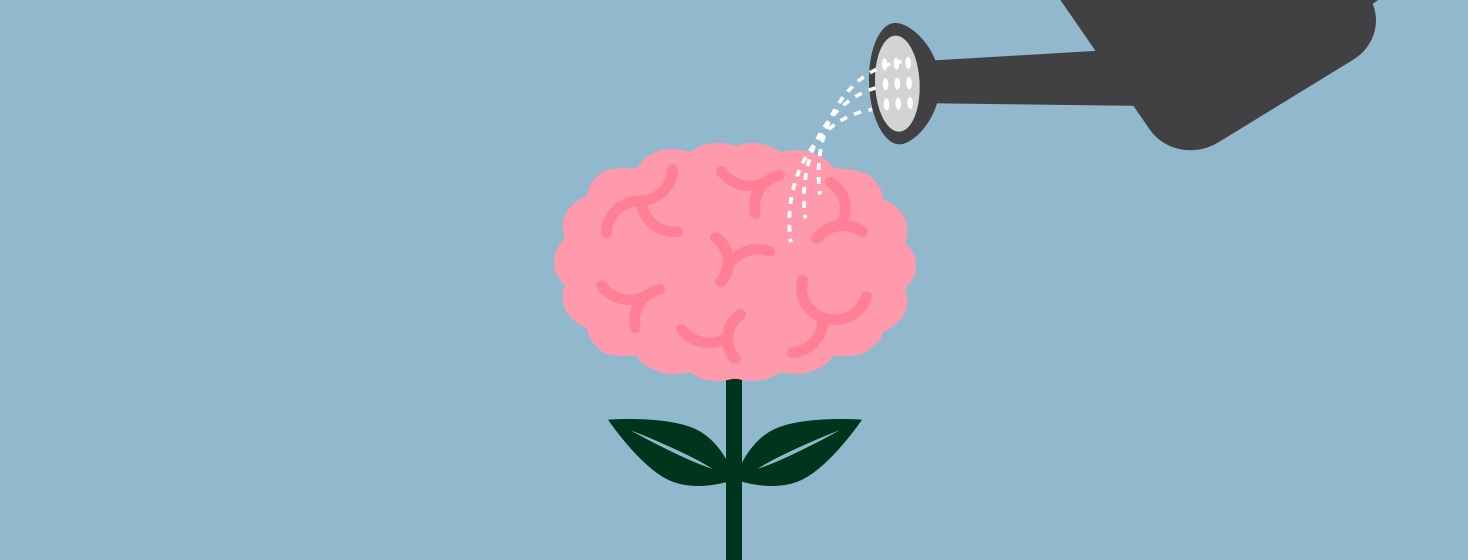 Brain with flower stem and leaves being watered by watering can