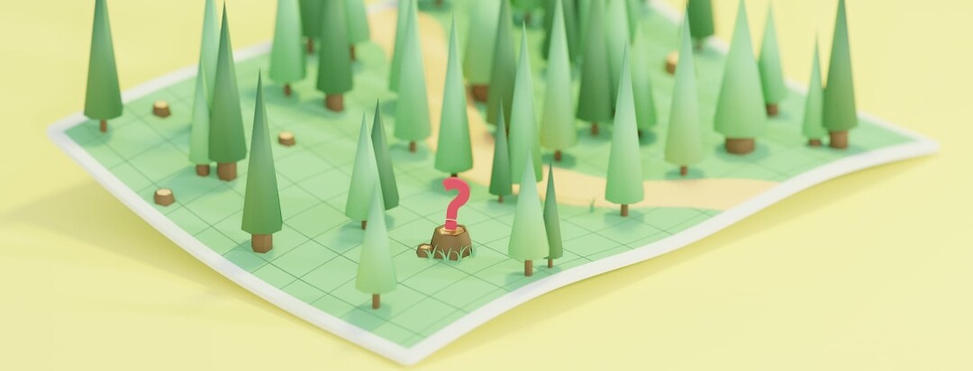 An unfolded map sitting on a surface. coming from the map are trees. In the closest corner is a tree stump with a bright red question mark floating above it.