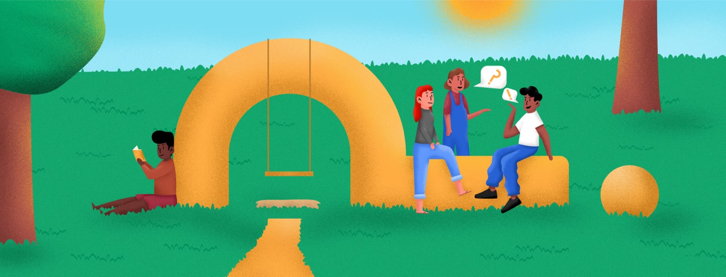 People sitting talking around a question mark shaped arch