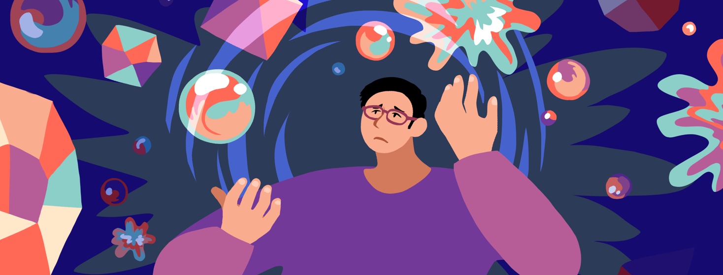 A person with a worried expression juggles multiple colorful blobs of different shapes and sizes