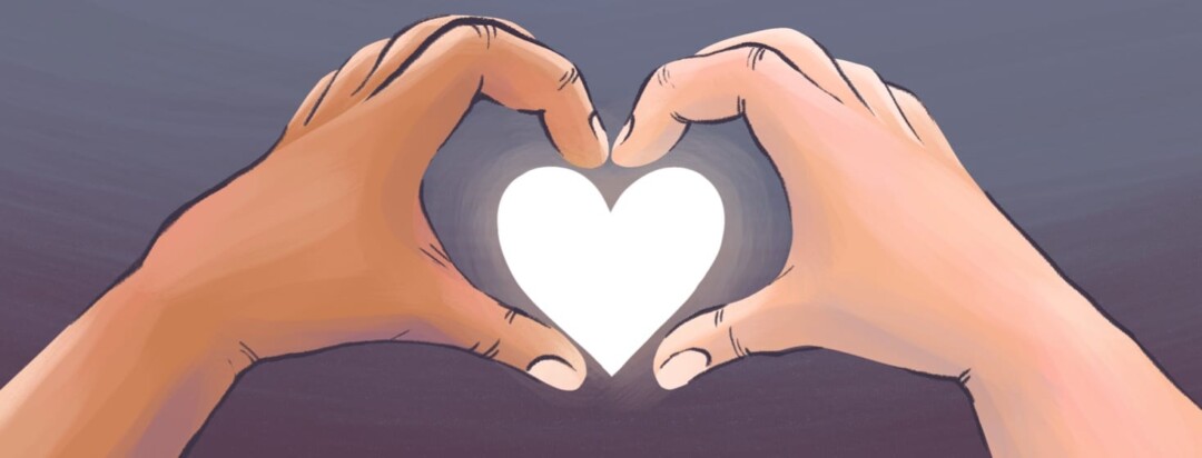 Two hands come together to form a heart shape